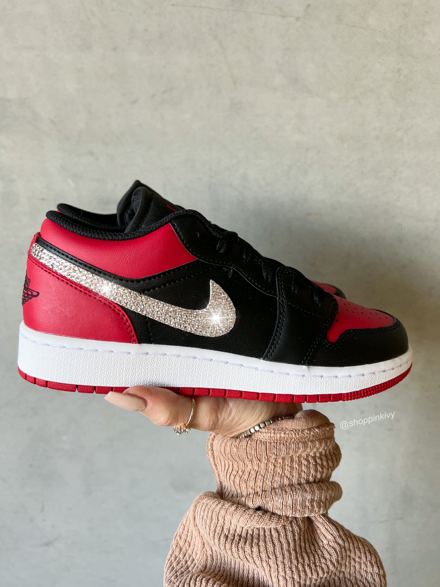 Air Jordan 1 low sneakers in black and gym red